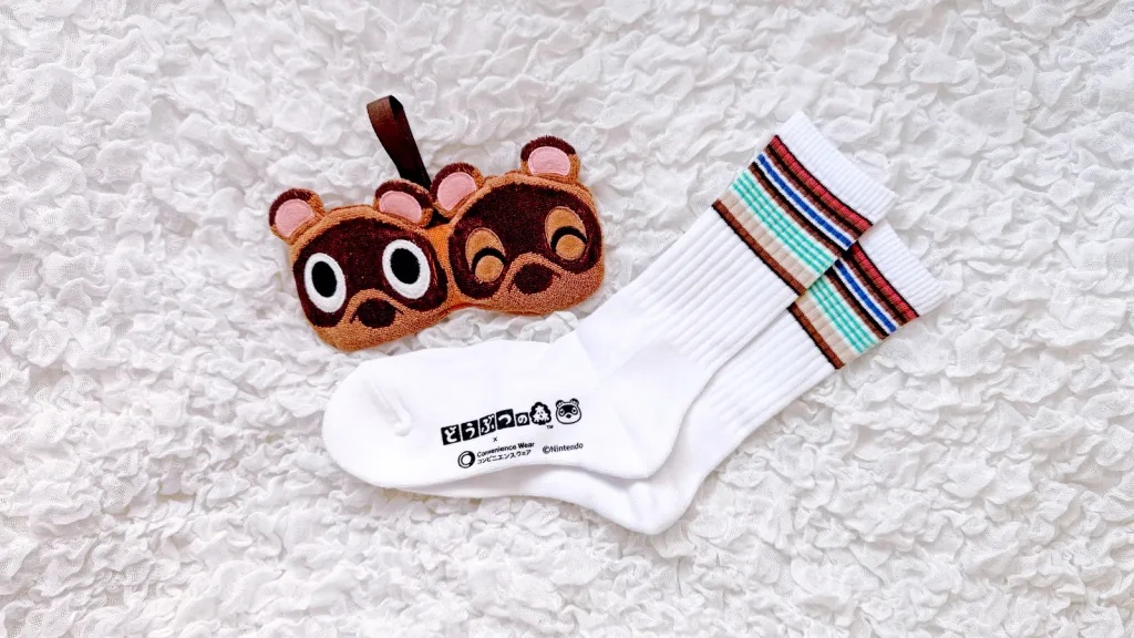 Animal Crossing plushie pouch towels and cozy socks show up at Family Mart convenience stores