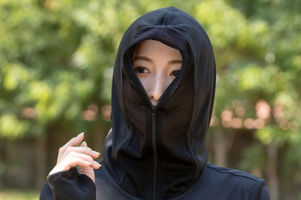 Japan's full-facemask Ninja Parka still lets you eat ice cream