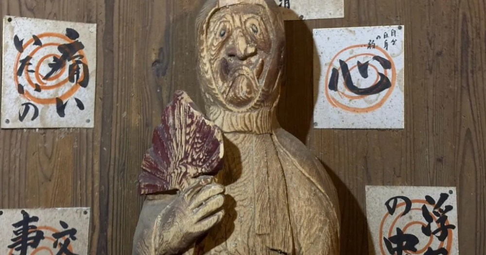 This shrine in Japan invites you to hit and kick its god of poverty statue for good luck [Photos]